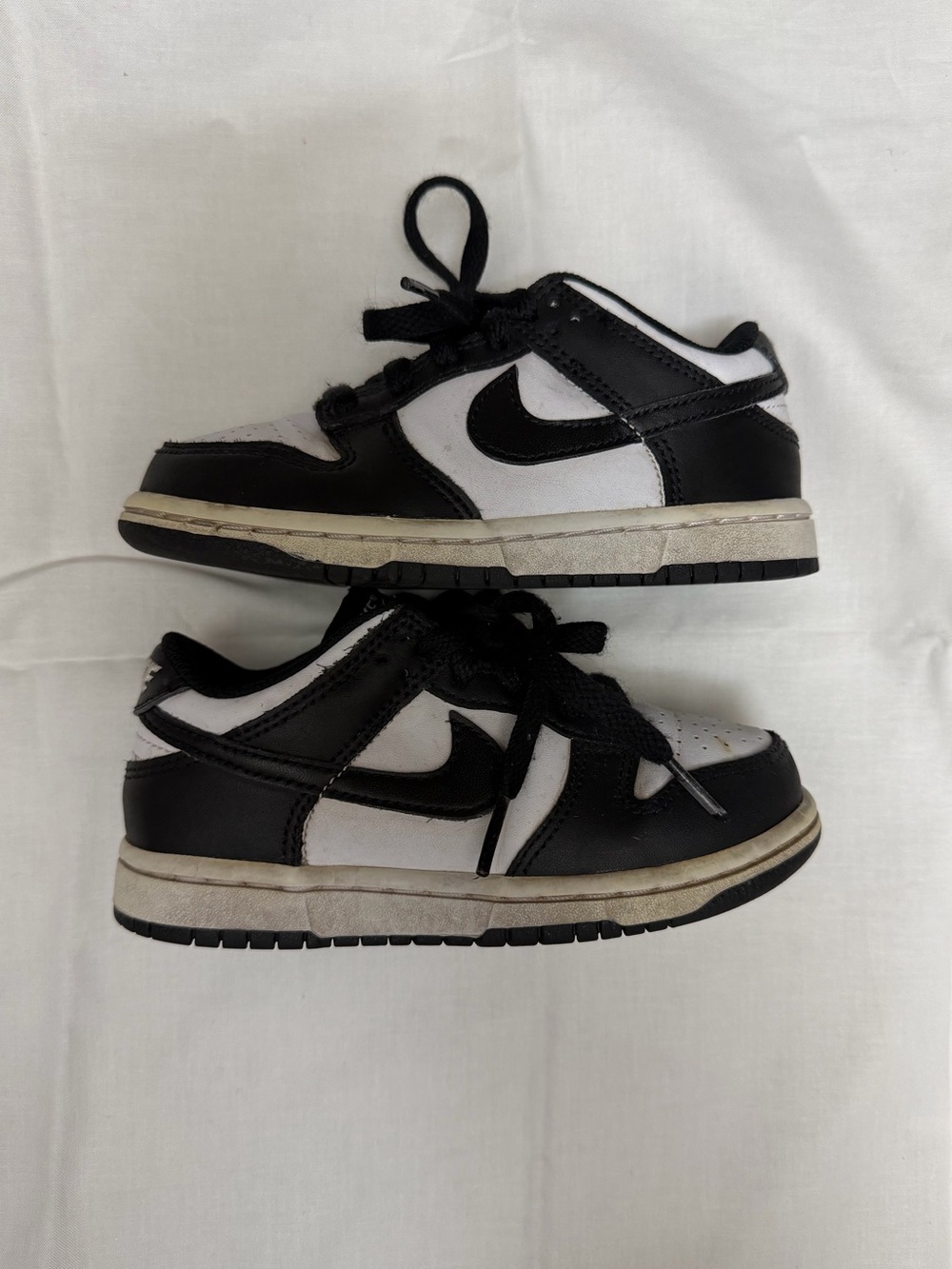 Nike Kids Black and White Low-Top Sneakers with Swoosh